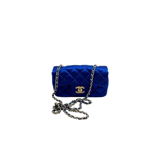 CHANEL Handbags - Vintage Chanel cornflower extra mini satin flap bag